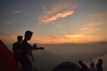 People take pictures at Sunrise Mountain