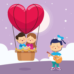 happy couple in heart air balloon and boy singing and playing guitar