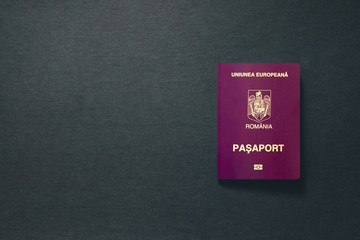 Romania Passport on dark background with copy space - 3D Illustration