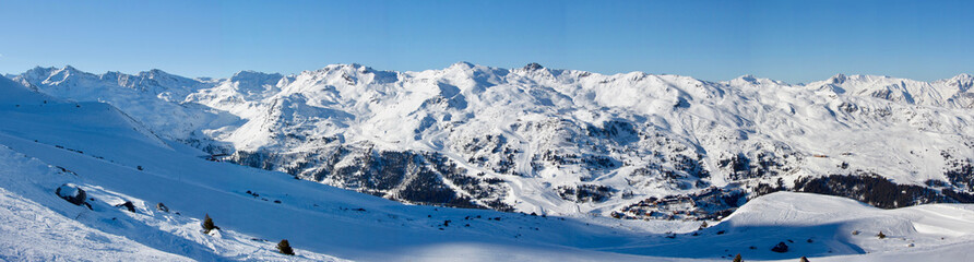 Fototapeta na wymiar Meribel mottaret panoramic valley view sun snowy mountain landscape France alpes 3 vallees
