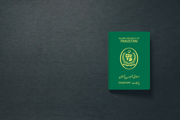 Pakistan Passport on dark background with copy space - 3D Illustration