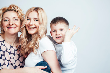 happy smiling blond family together posing cheerful on white background, generation concept. lifestyle people