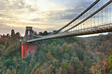 View in a winter sunset of the Clifton Suspension Bridge, a suspension bridge spanning the Avon Gorge and the River Avon in the city of Bristol, UK