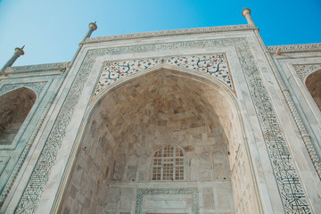 Taj Mahal is an ivory-white marble mausoleum on the south bank of the Yamuna river in the Indian...