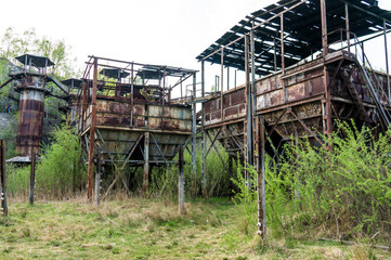 Rusty industrial towers of Liban Quarry, abandoned industrial location in Krakow, Poland