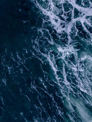 Aerial bird's eye view of waves in the cold winter ocean © Jimmy