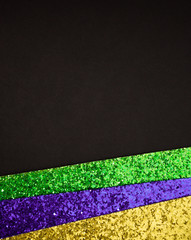 Shiny green, purple and golden pattern background