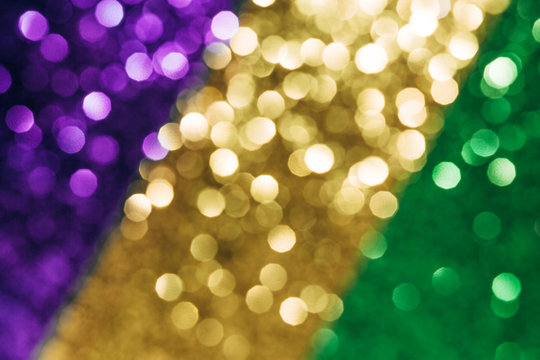 Shiny green, purple and golden pattern background
