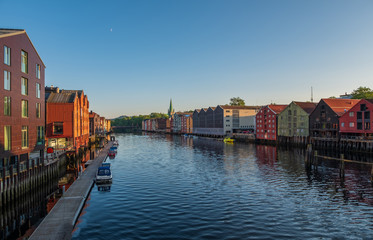 Naklejka premium Evening sunset cityscape of Trondheim, Norway - architecture background in july 2019