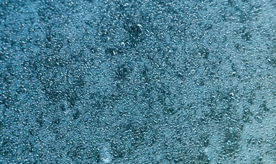 Drops of clean water on the glass