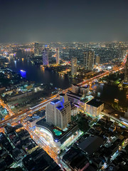 BANGKOK, THAILAND - DECEMBER 14, 2019: Aerial view of the city at night