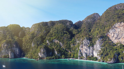 Fototapeta na wymiar Amazing coastline with coral reef and trees over rocks