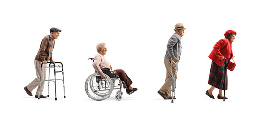 Group of senior people walking in a line with orthopedic equipment