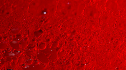 red background with soap bubbles
