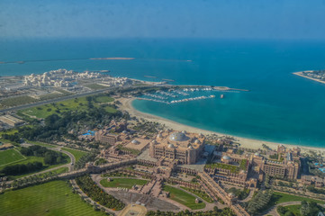Fototapeta na wymiar Bird's eye and aerial drone view of Abu Dhabi city from observation deck