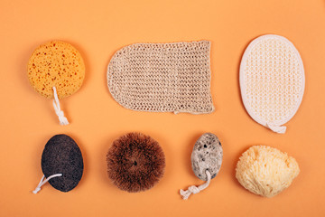 Different types of zero waste sponges for body care. Concept of eco friendly supplies for self-care. Flat lay style.