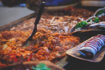 Variety assortment of different traditional Hungarian street food at one of the stalls in the streets of Budapest, Hungary, spring and Easter Market