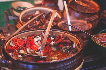 Variety assortment of different traditional Hungarian street food at one of the stalls in the streets of Budapest, Hungary, spring and Easter Market