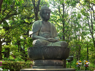 buddha statue with hands in lap at sensoji temple in tokyo