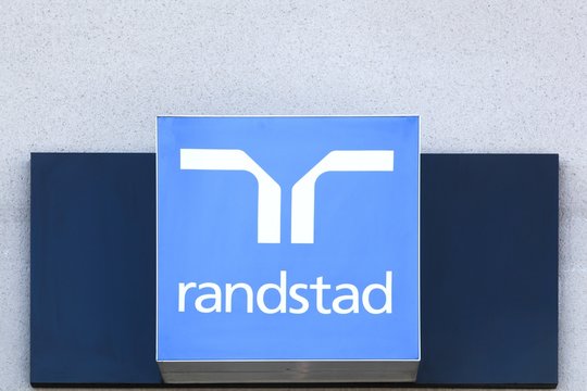 Villefranche, France - March 14, 2018: Randstad logo on a wall. Randstad is a Dutch multinational human resource consulting firm headquartered in Diemen, Netherlands