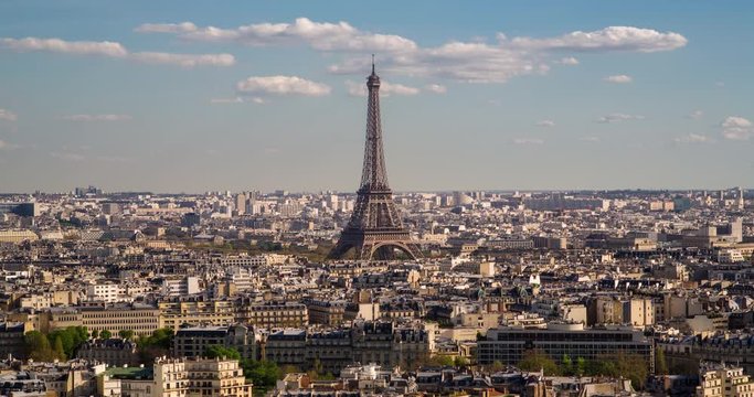 Eiffel Tower, elevated aerial view over rooftops, Paris, France, Europe - Time lapse
