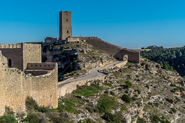 Fototapeta na wymiar Aerial view of Alarcon castle, parador and fortifications along the Jucar river in Cuenca province Spain