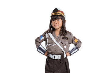 police girl wearing a uniform with two hands on her waist on white background