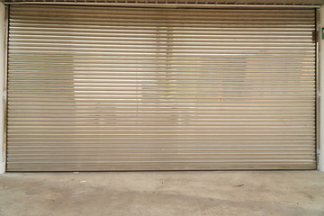 background of the sliding door and the Stainless Rolling Shutter Door  is closed.