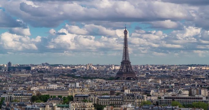 Eiffel Tower, elevated aerial view over rooftops, Paris, France, Europe - Time lapse