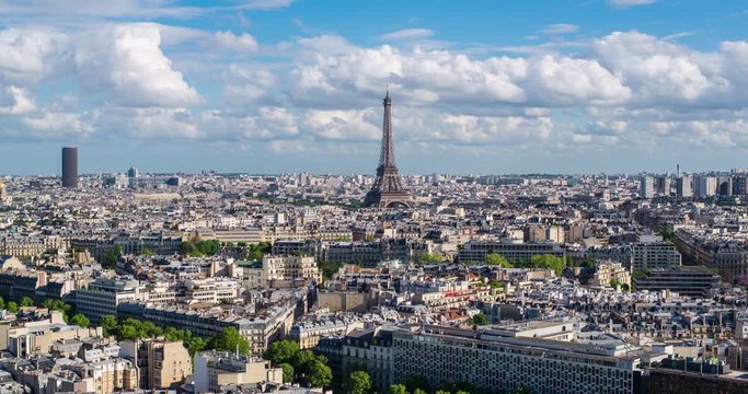 Eiffel Tower, elevated aerial view over rooftops, Paris, France, Europe - Time lapse