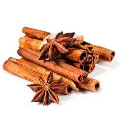 Cinnamon sticks and star anise spices isolated on white background
