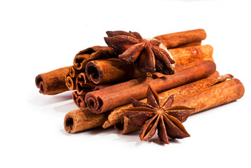 Cinnamon sticks and star anise spices isolated on white background
