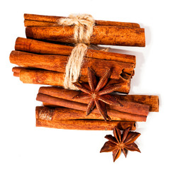 Cinnamon sticks and star anise spices isolated on white background