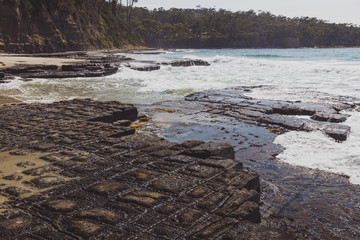 view of the Tessalated Pavement in Eaglehack Neck in the Tasman Peninsula in Tasmania