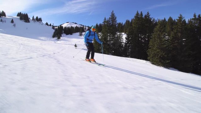 professional skier skiing on slopes in the Swiss alps
