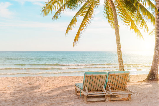 Chairs on the sandy beach near the sea,Beautiful beach,Summer holiday and vacation concept for tourism. Inspirational tropical landscape.