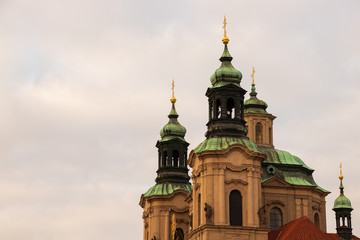 Fototapeta na wymiar St. Nicholas Church at Old Town Square towers