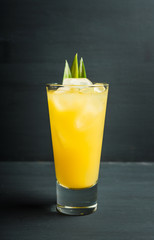 Pineapple cocktail in highball glass. Selective focus. Shallow depth of field.