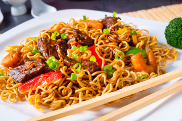 Fried Mie noodles with beef and vegetables.