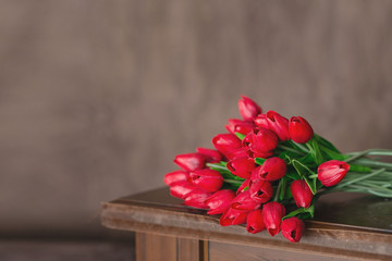 Bouquet of red tulips for Valentine's day as a surprise or birthday.