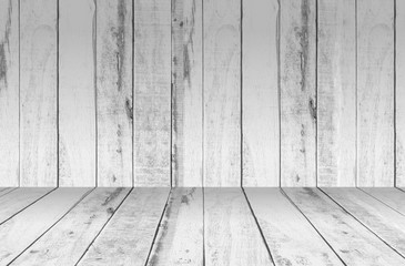 white wall and wooden floor