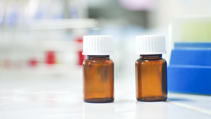 Blank brown bottle in laboratory.