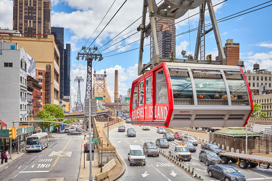 New York, USA - May 26, 2017: Cable car arrives at Manhattan station. The tram connects Roosevelt Island to the Upper East Side of Manhattan.