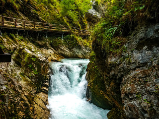 View on walk path at the Vintgar Gorge waterfall in Slovenia