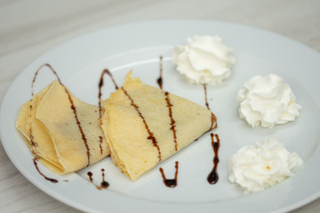 pancakes with whipped cream ,Sweet Crepes with chocolate and Whipped Cream