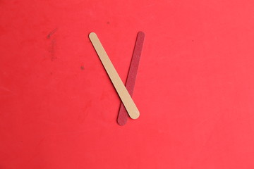 Nail file on colorful background