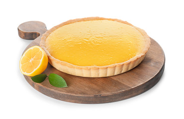 Board with tasty lemon pie on white background