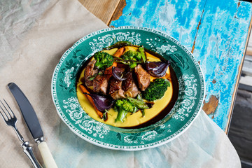 Veal stew with hummus. The cuisine of Tel Aviv.