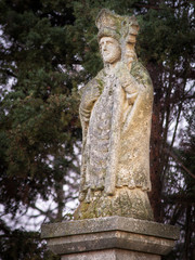 Waycross with statue of a bishop in woodland in Burgenland