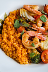 Shrimp with vegetables. The cuisine of Tel Aviv.